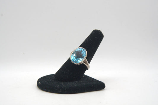 Oval Cut Blue Topaz Bezel Silver Ring